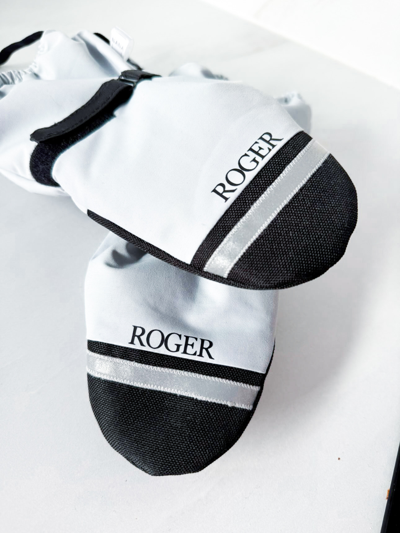 tekst kaelusele, mütsil, kinnastele