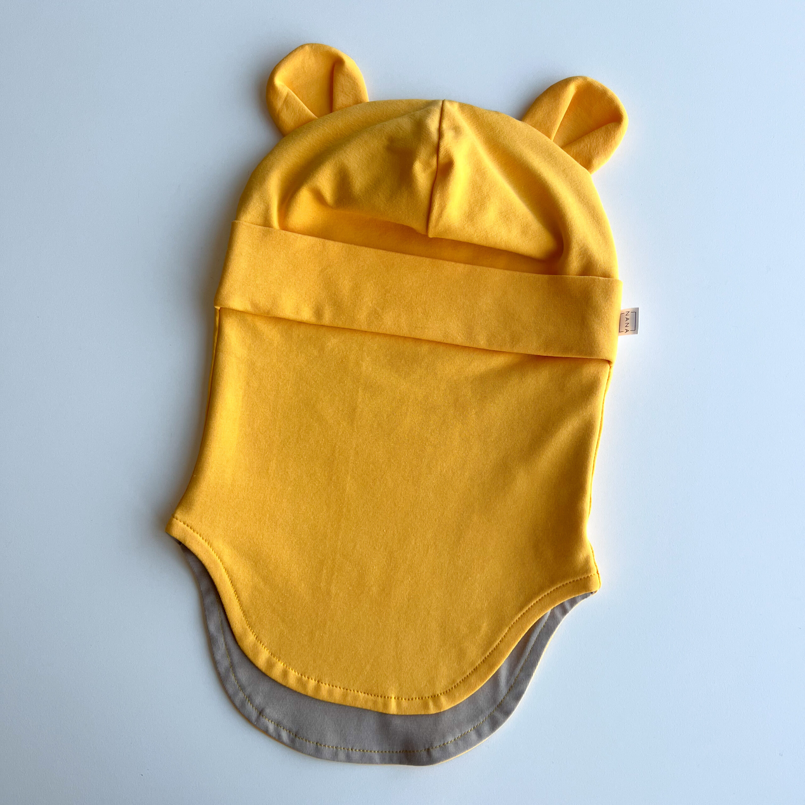 tuukrimüts puuvillane kollane kõrvadega