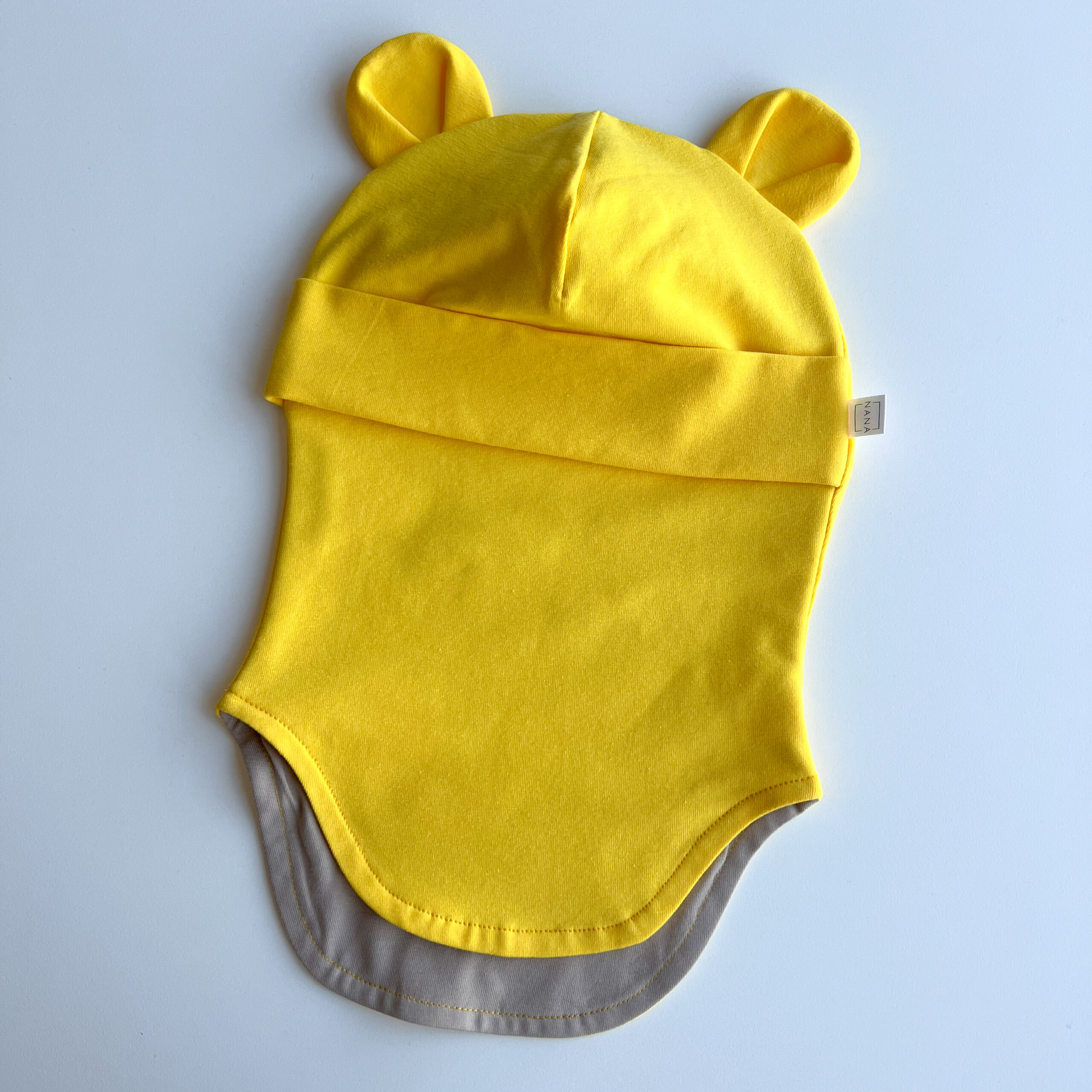 tuukrimüts puuvillane päikesekollane kõrvadega